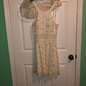 White and gold fit and flare dress